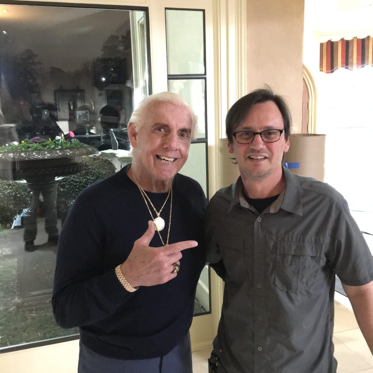 Production sound mixer on set with nature boy.